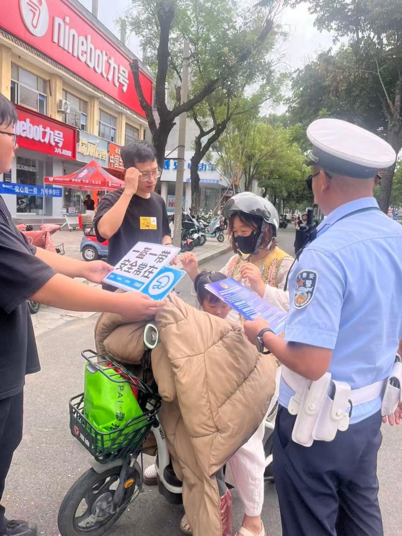 拒绝非法改装 共建文明交通 九号电动车联合山东泰安交警开展公益宣传